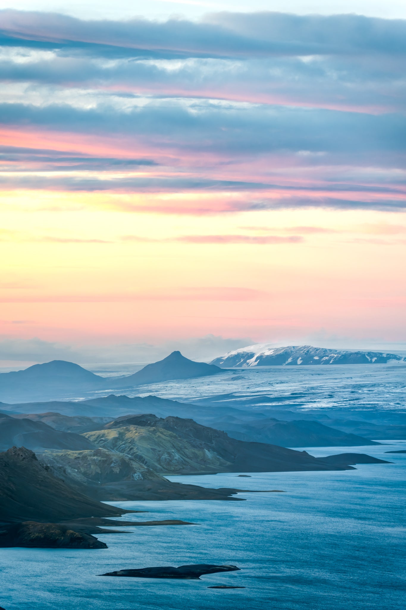 Langisjor. Scenic view of mountains and water with a colorful sky