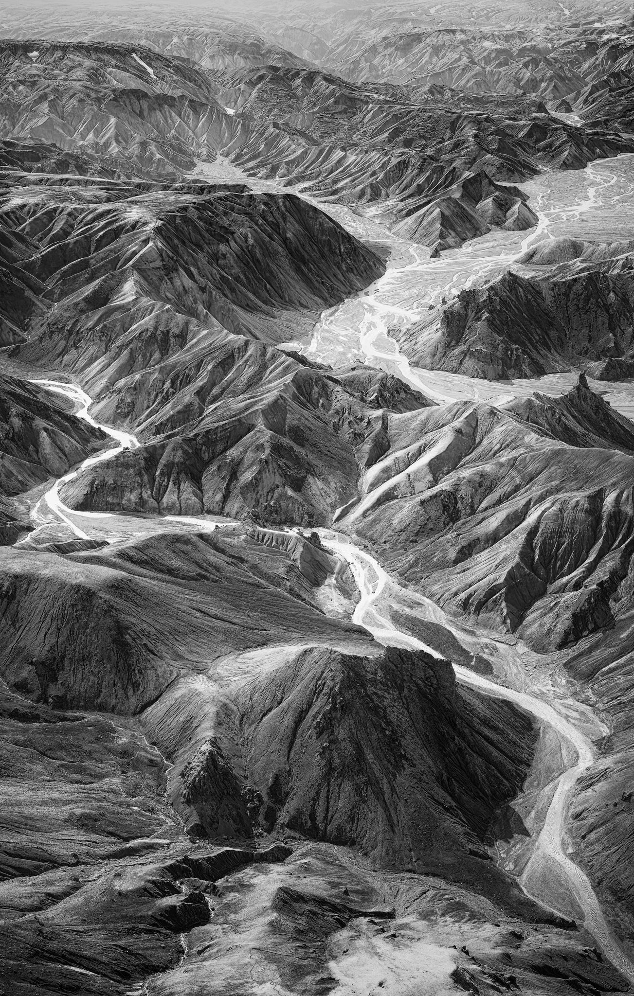 Landmannalaugar. Aerial view of a river cutting through a mountainous landscape