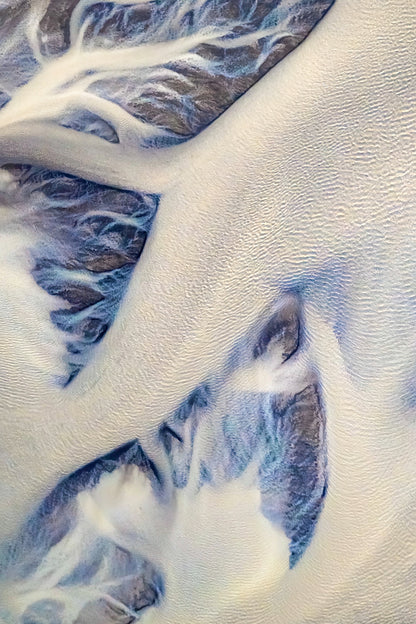 Iceland Glacial river. Close-up of textured white and blue fabric