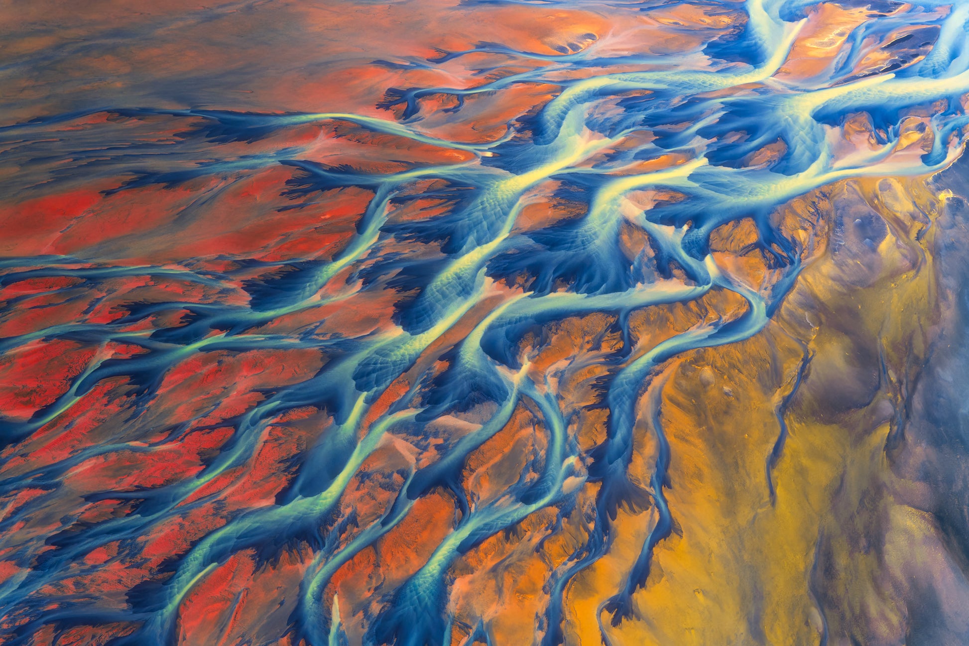 Iceland Glacial River. Aerial view of colorful river systems in a desert landscape